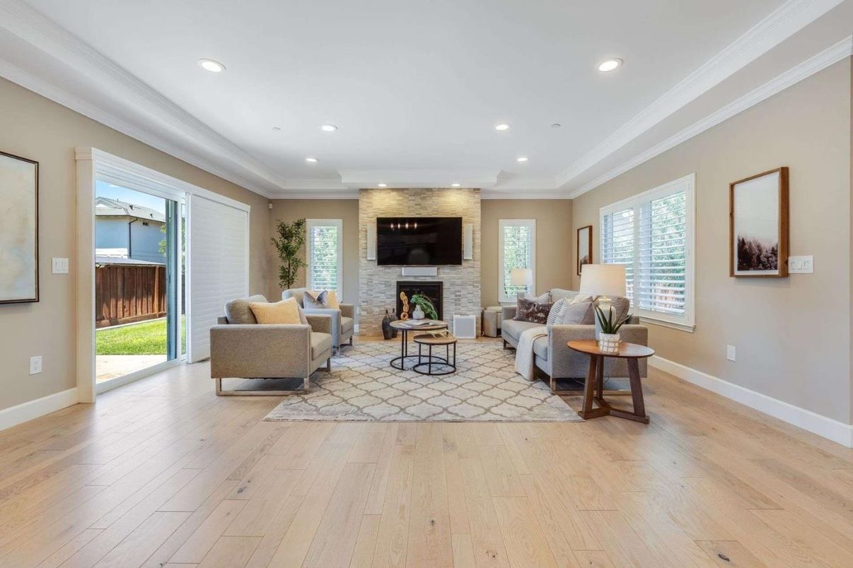 Fireplace, Interior, Living room, Recessed Lighting, Stone Walls, Wood Texture Flooring