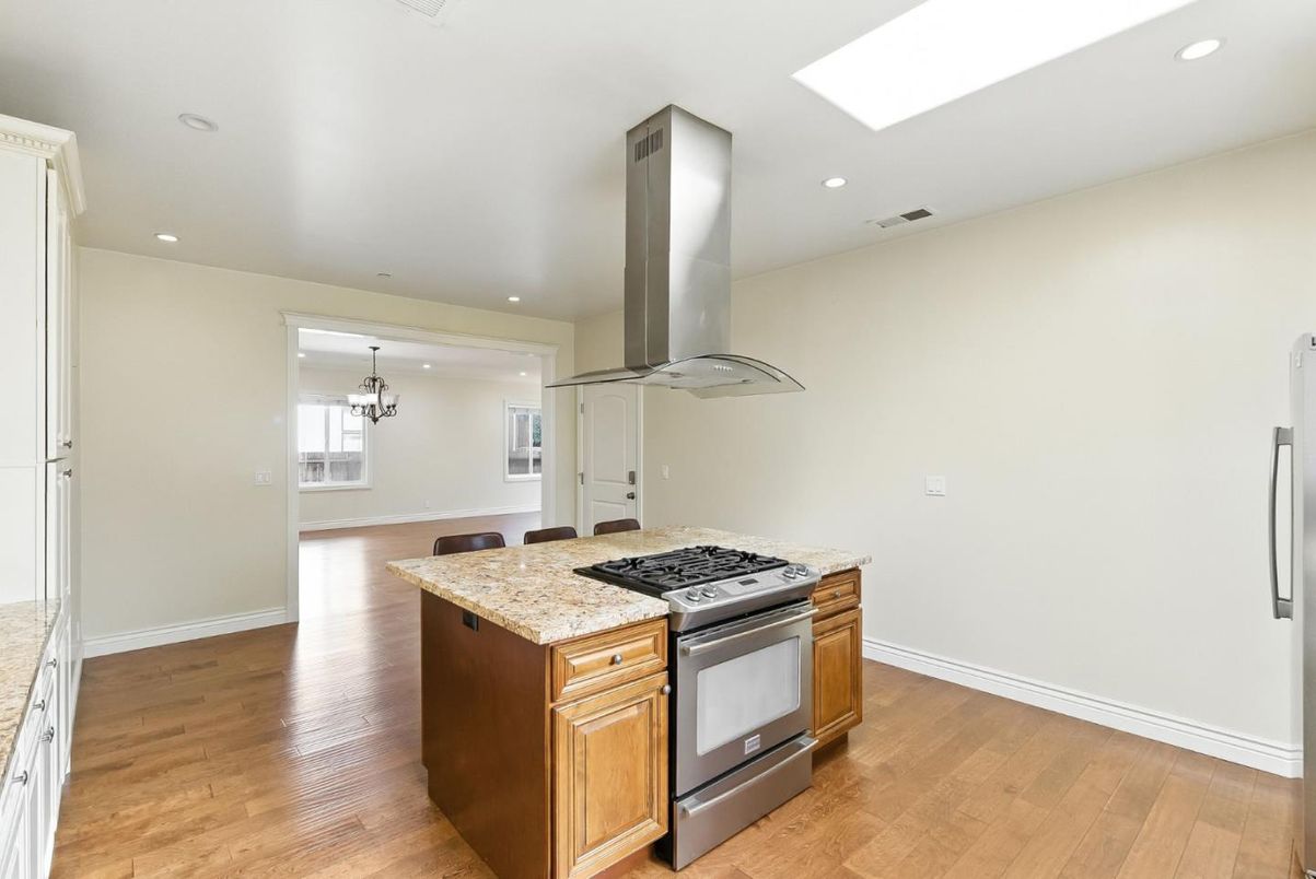 Chandelier, Interior, Kitchen, Pendant Lights, Recessed Lighting, Stainless Steel Appliances, Wood Texture Flooring