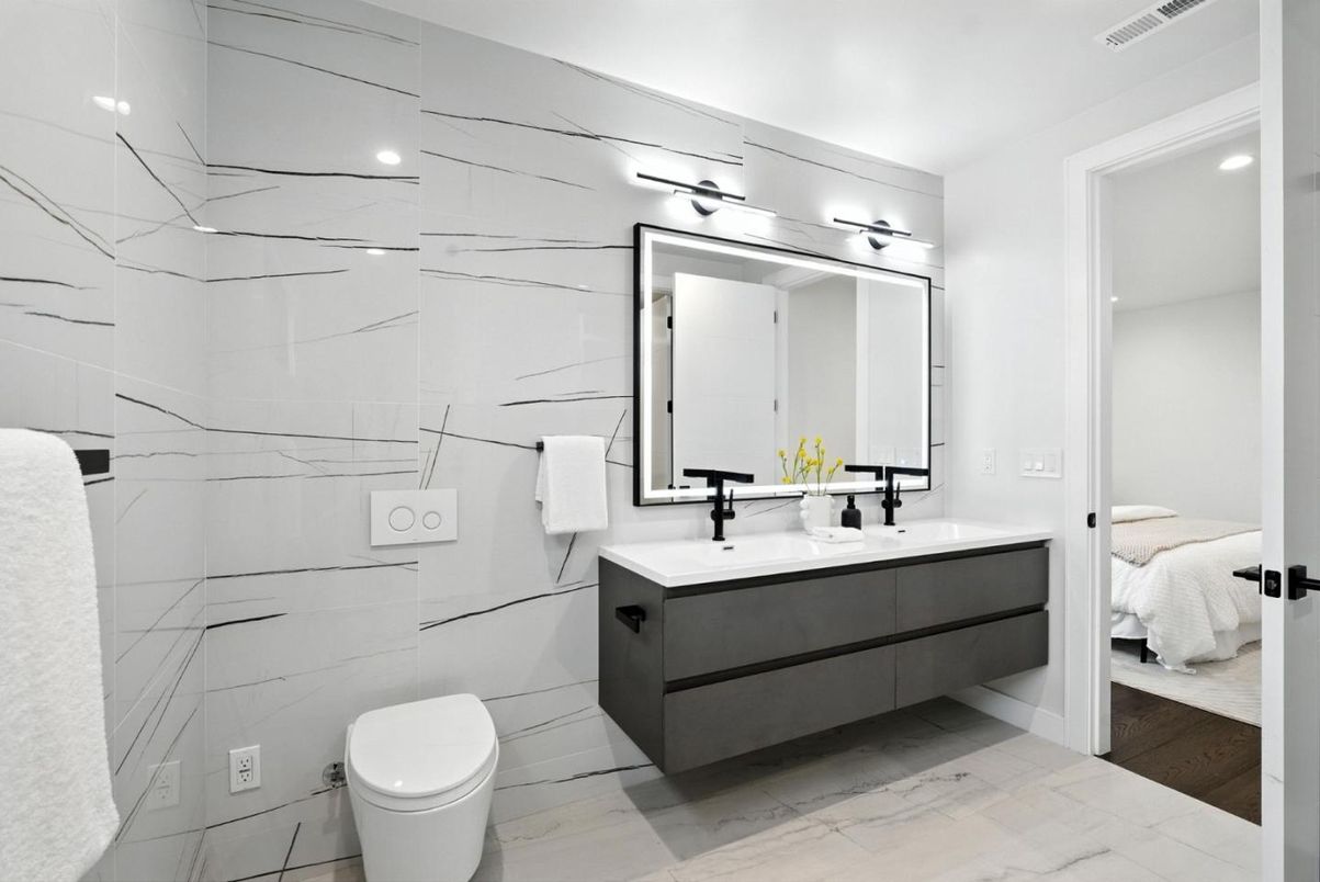 Bathroom, Bedroom, Dual Sink Vanities, Interior, Marble Walls, Recessed Lighting, Wood Texture Flooring