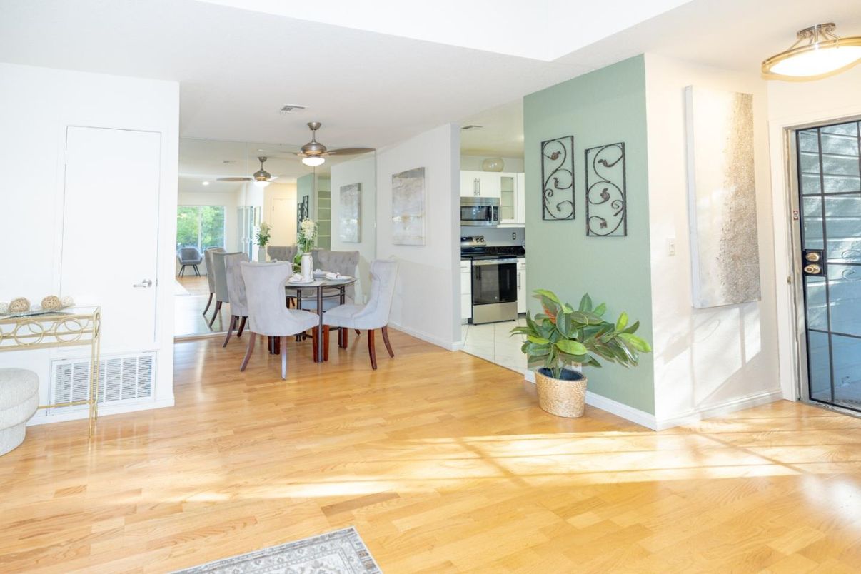 Dining room, Interior, Kitchen, Recessed Lighting, Stainless Steel Appliances, Wood Texture Flooring