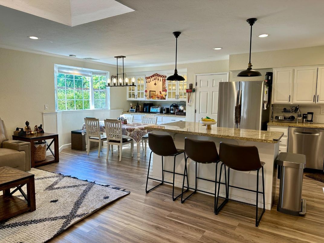 Dining room, Interior, Kitchen, Pendant Lights, Recessed Lighting, Stainless Steel Appliances, Wood Texture Flooring