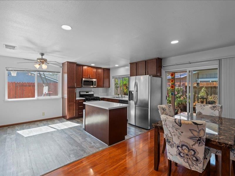 Dining room, Interior, Kitchen, Recessed Lighting, Stainless Steel Appliances, Wood Texture Flooring