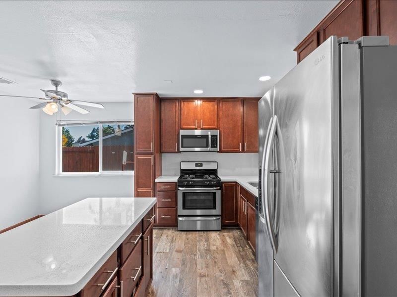 Interior, Kitchen, Recessed Lighting, Stainless Steel Appliances, Wood Texture Flooring