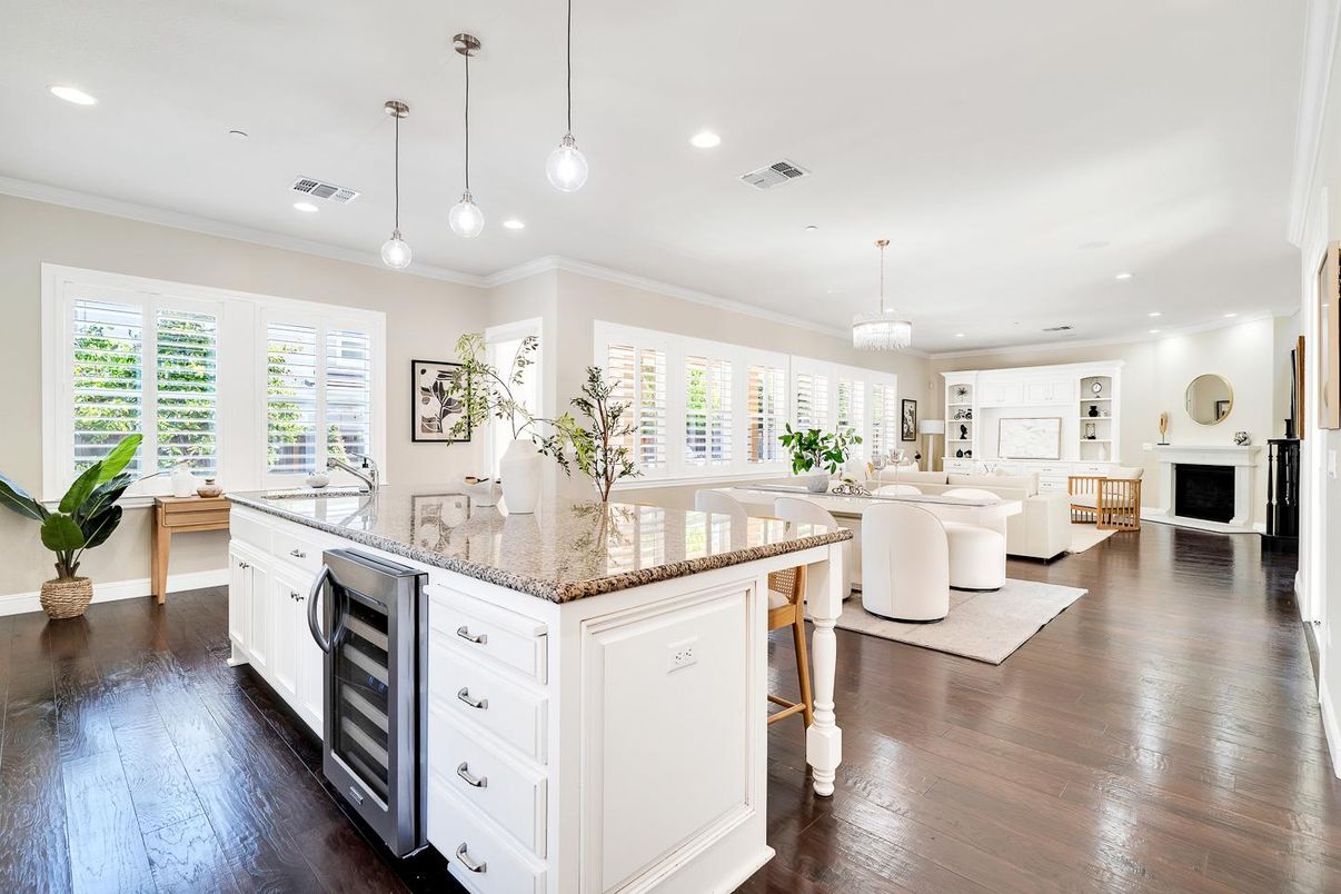 Chandelier, Dining room, Fireplace, Interior, Kitchen, Living room, Pendant Lights, Recessed Lighting, Wood Texture Flooring