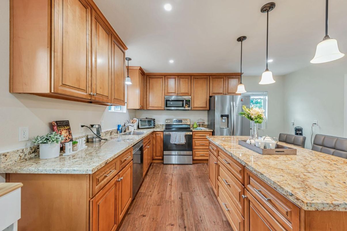 Interior, Kitchen, Pendant Lights, Recessed Lighting, Stainless Steel Appliances, Wood Texture Flooring