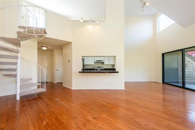 Empty room, Interior, Kitchen, Stainless Steel Appliances, Wood Texture Flooring