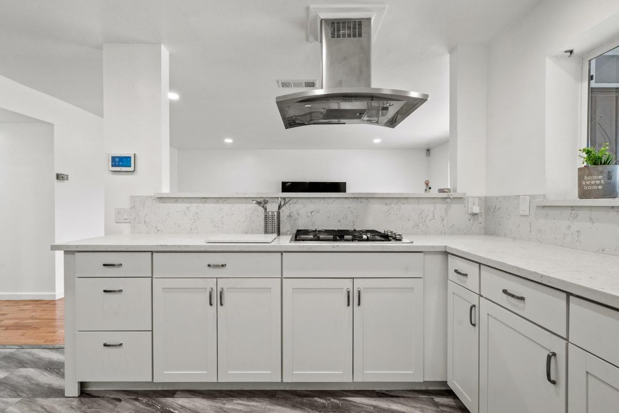 Interior, Kitchen, Marble Walls, Recessed Lighting, Wood Texture Flooring