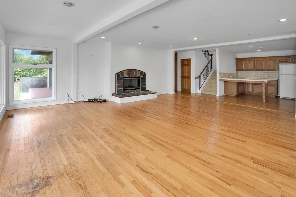 Empty room, Fireplace, Interior, Kitchen, Recessed Lighting, Wood Texture Flooring