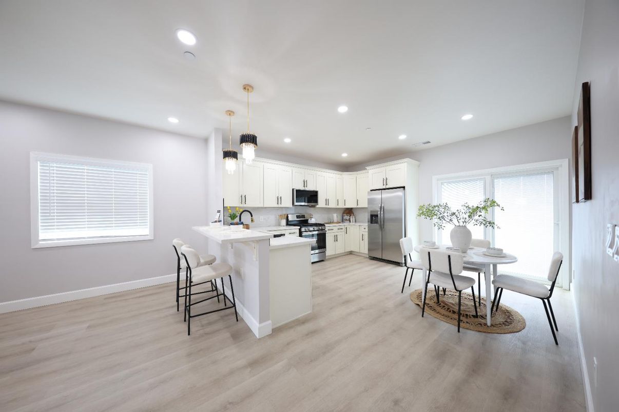 Dining room, Interior, Kitchen, Pendant Lights, Recessed Lighting, Stainless Steel Appliances, Wood Texture Flooring