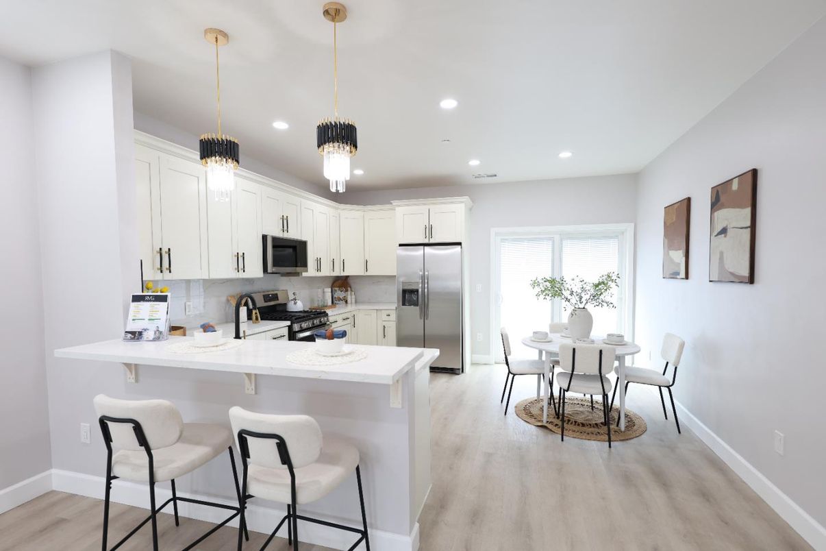 Dining room, Interior, Kitchen, Pendant Lights, Recessed Lighting, Stainless Steel Appliances, Wood Texture Flooring