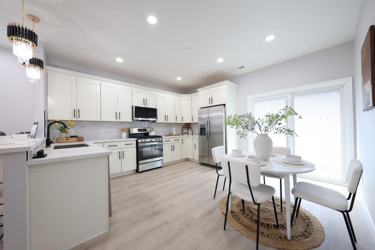 Dining room, Interior, Kitchen, Pendant Lights, Recessed Lighting, Stainless Steel Appliances, Wood Texture Flooring