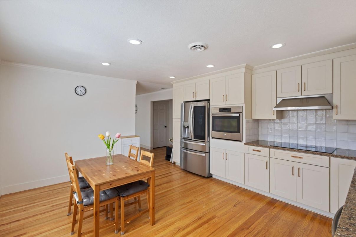 Dining room, Interior, Kitchen, Recessed Lighting, Stainless Steel Appliances, Wood Texture Flooring