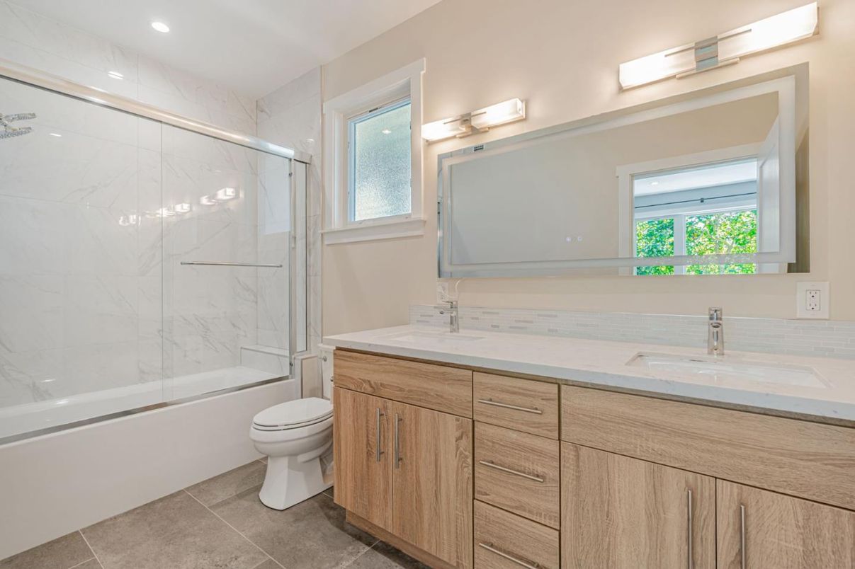 Bathroom, Dual Sink Vanities, Glass Shower, Interior, Marble Walls, Recessed Lighting