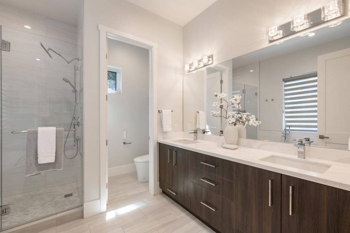 Bathroom, Dual Sink Vanities, Glass Shower, Interior, Marble Walls, Recessed Lighting