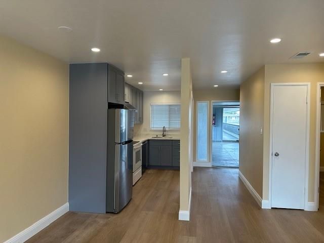 Interior, Kitchen, Recessed Lighting, Stainless Steel Appliances, Wood Texture Flooring