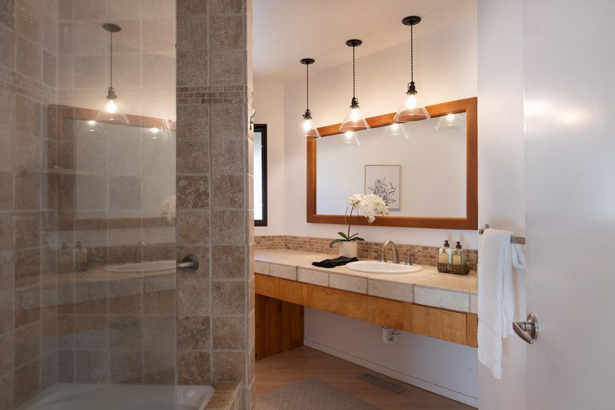 Bathroom, Glass Shower, Interior, Pendant Lights, Tile Countertops, Wood Texture Flooring