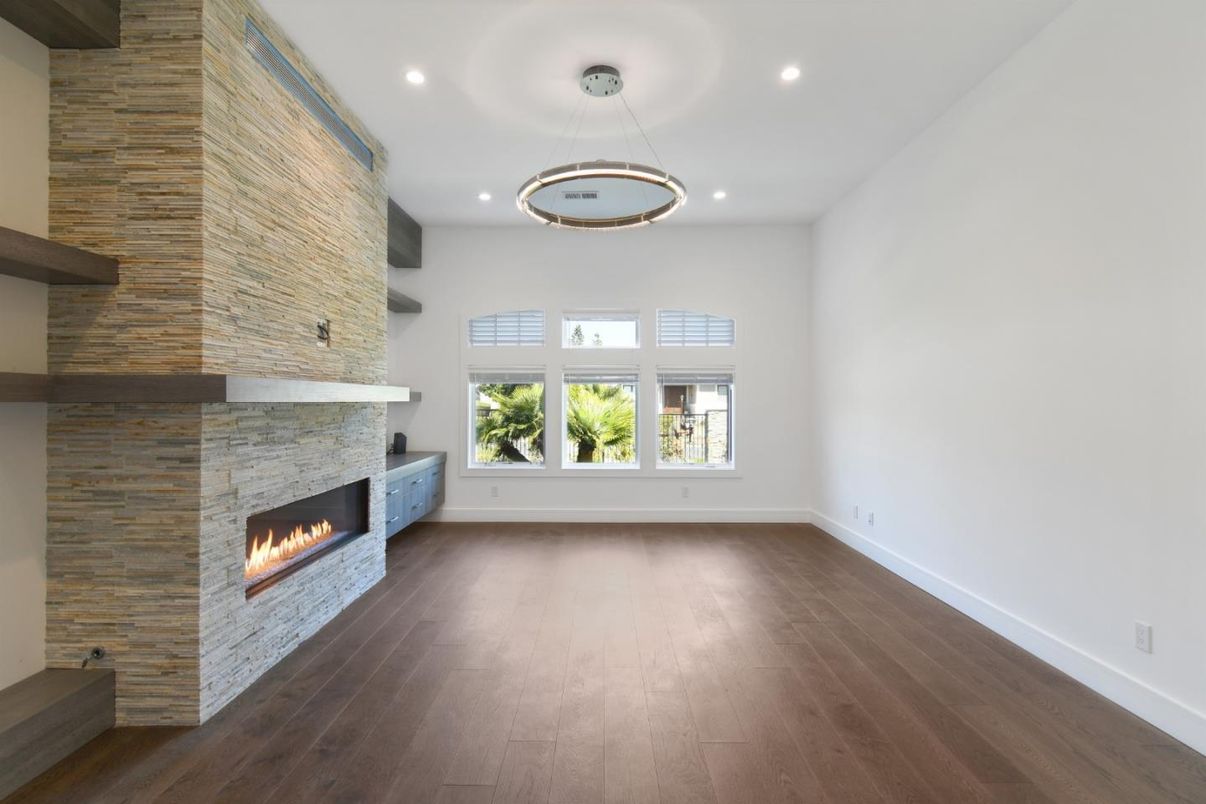 Empty room, Fireplace, Interior, Pendant Lights, Recessed Lighting, Wood Texture Flooring