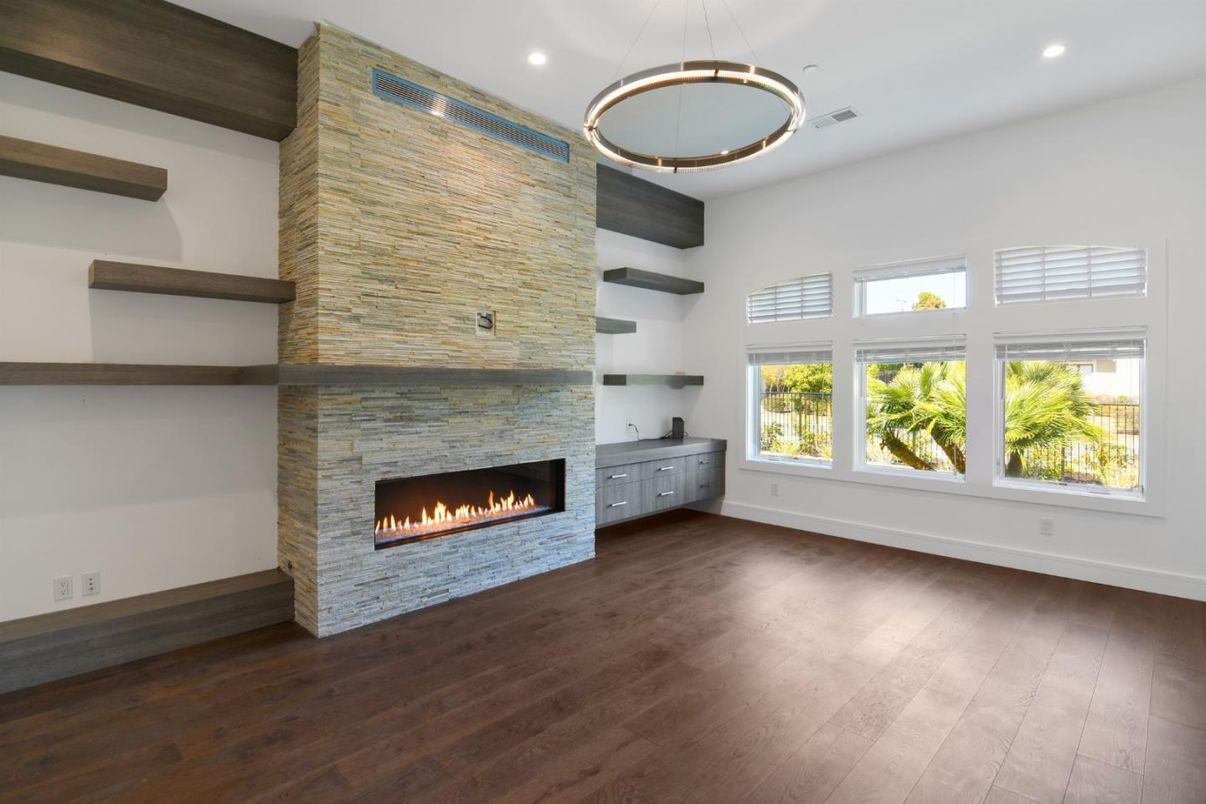 Empty room, Fireplace, Interior, Pendant Lights, Recessed Lighting, Wood Texture Flooring
