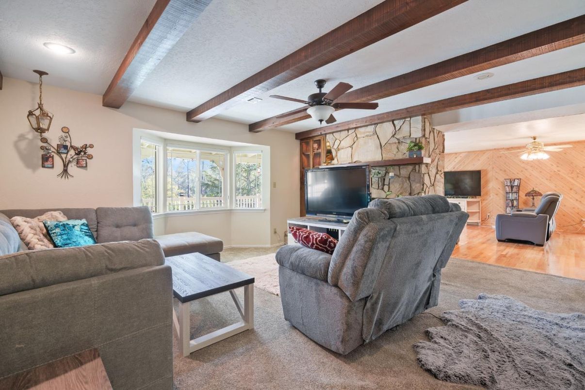 Fireplace, Interior, Living room, Recessed Lighting, Stone Walls, Wooden Beams, Wood Texture Flooring