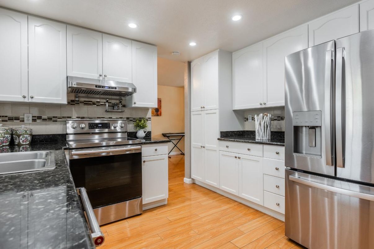 Interior, Kitchen, Recessed Lighting, Stainless Steel Appliances, Wood Texture Flooring