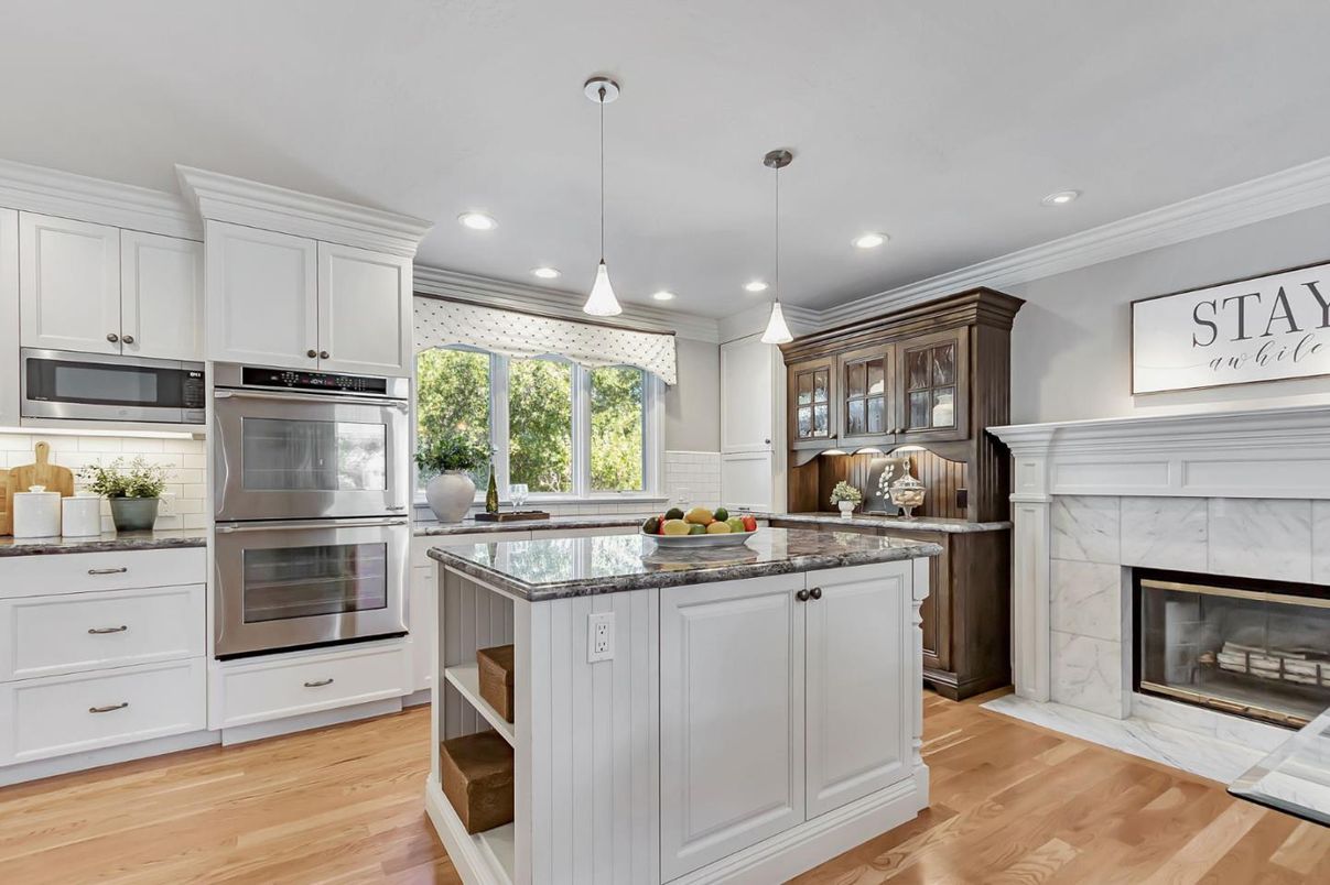 Fireplace, Interior, Kitchen, Pendant Lights, Recessed Lighting, Stainless Steel Appliances, Wood Texture Flooring