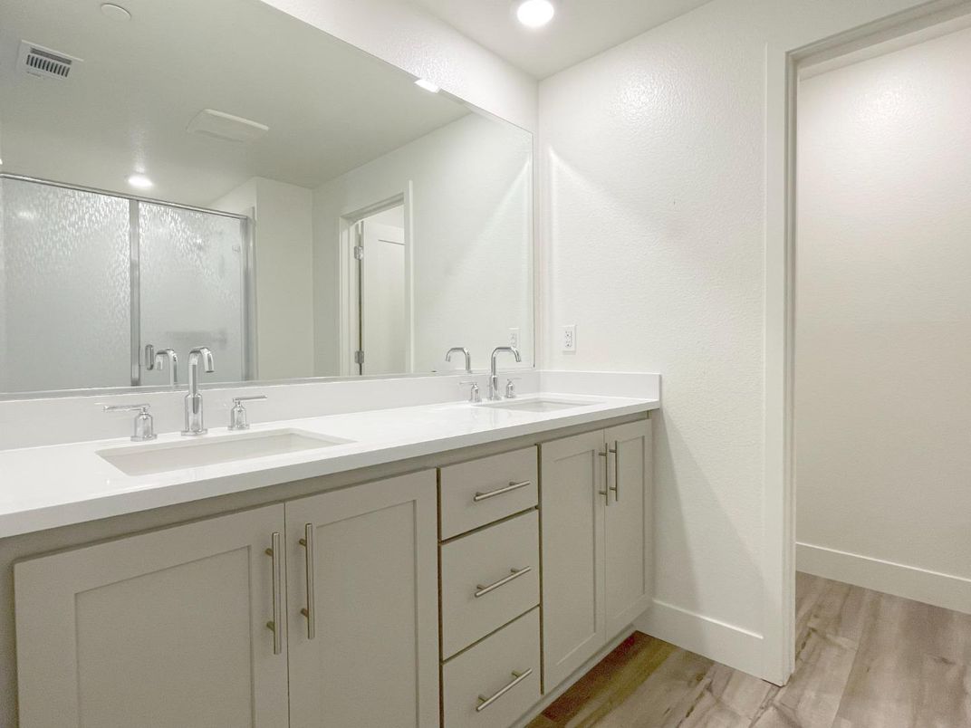 Bathroom, Dual Sink Vanities, Interior, Recessed Lighting, Wood Texture Flooring