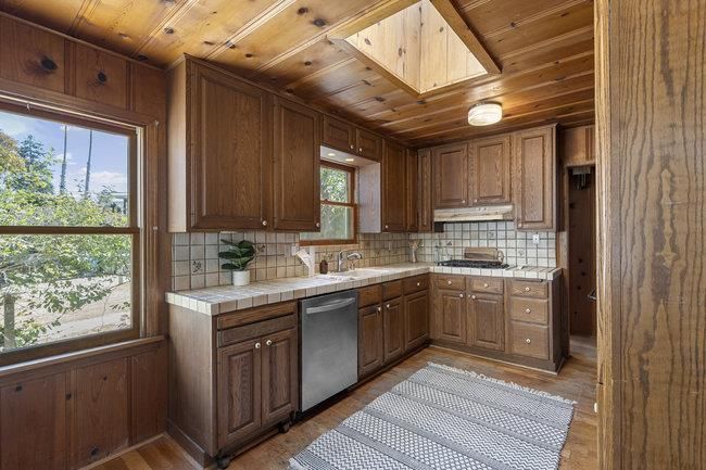 Interior, Kitchen, Tile Countertops, Wooden Ceilings, Wood Texture Flooring, Wooden Walls