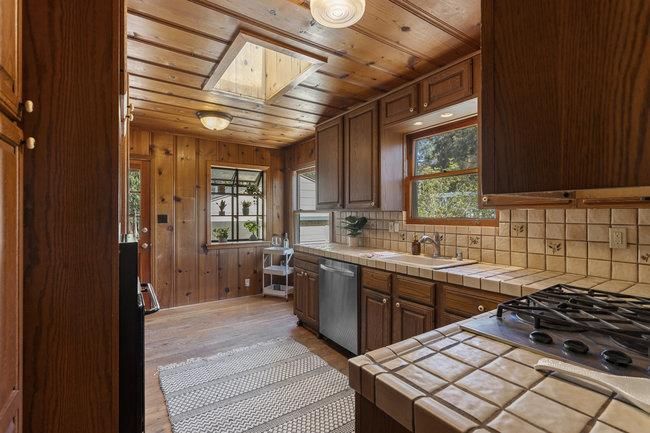 Interior, Kitchen, Tile Countertops, Wooden Ceilings, Wood Texture Flooring, Wooden Walls