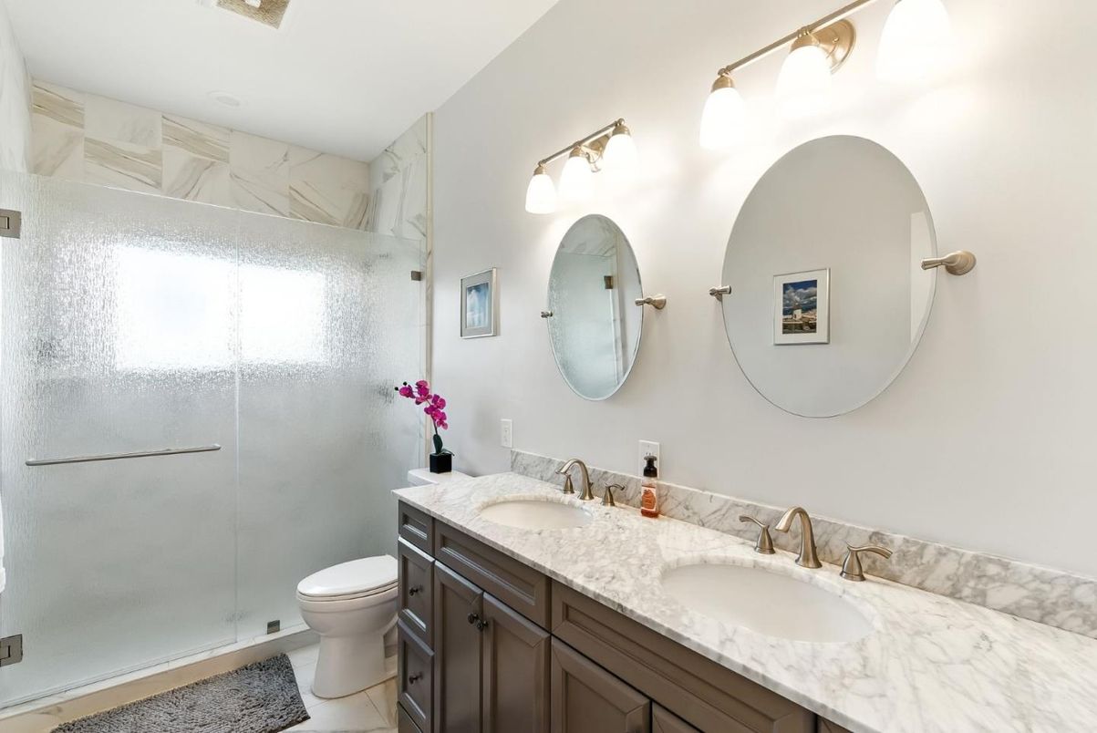 Bathroom, Dual Sink Vanities, Glass Shower, Interior, Marble Walls