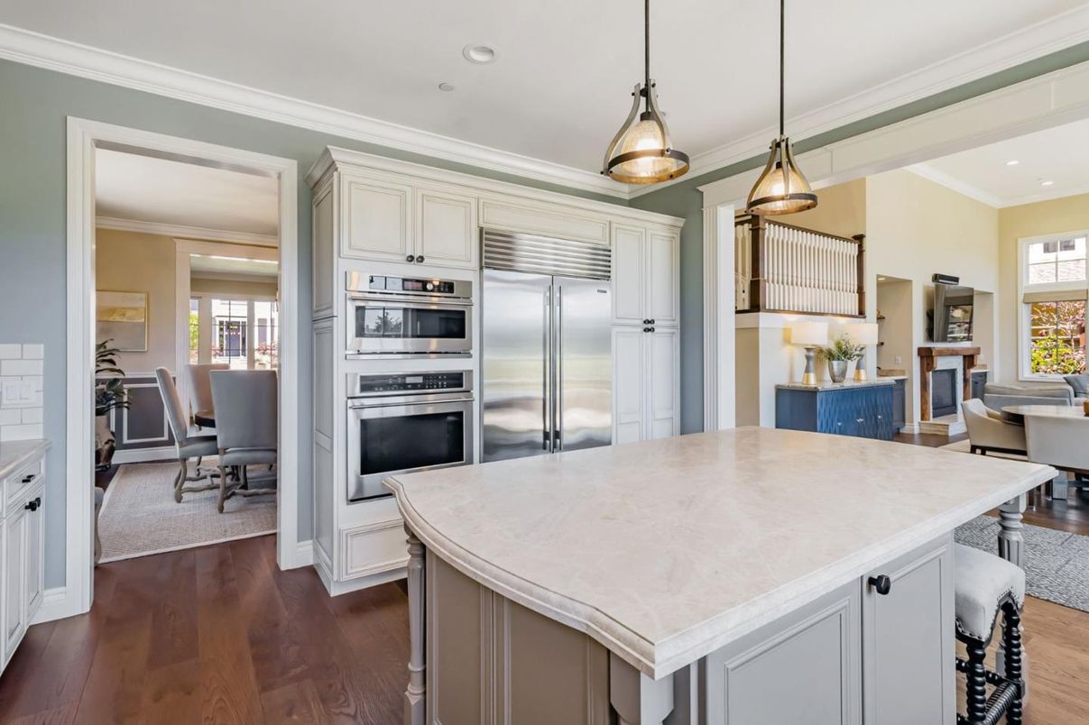 Dining room, Interior, Kitchen, Pendant Lights, Recessed Lighting, Stainless Steel Appliances, Wood Texture Flooring