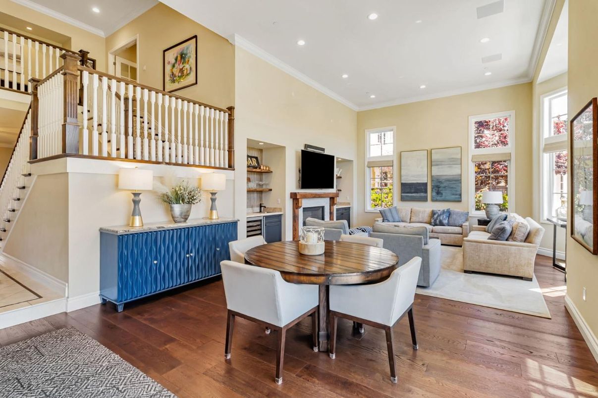 Dining room, Fireplace, Interior, Living room, Recessed Lighting, Wood Texture Flooring