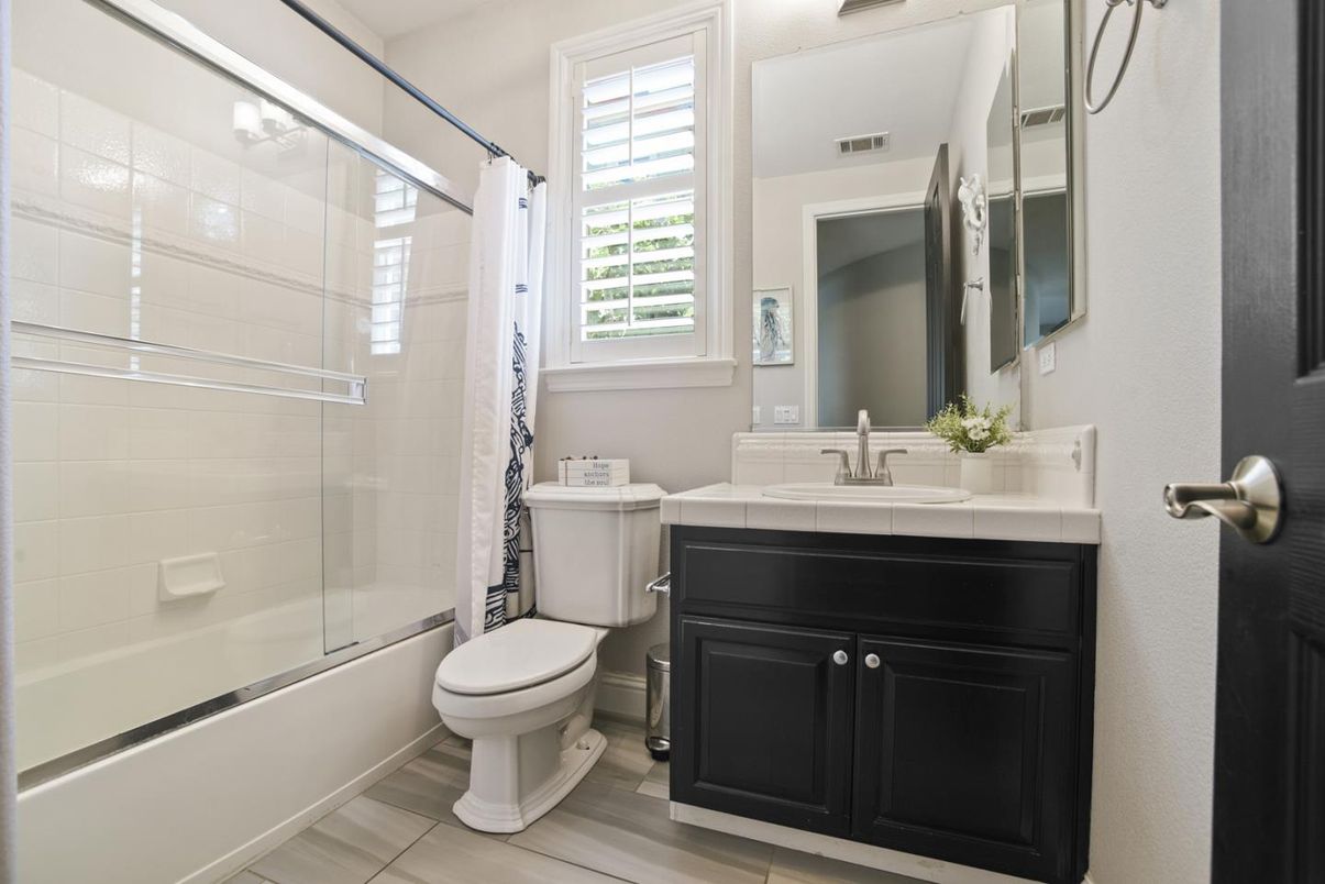 Bathroom, Glass Shower, Interior, Tile Countertops, Wood Texture Flooring