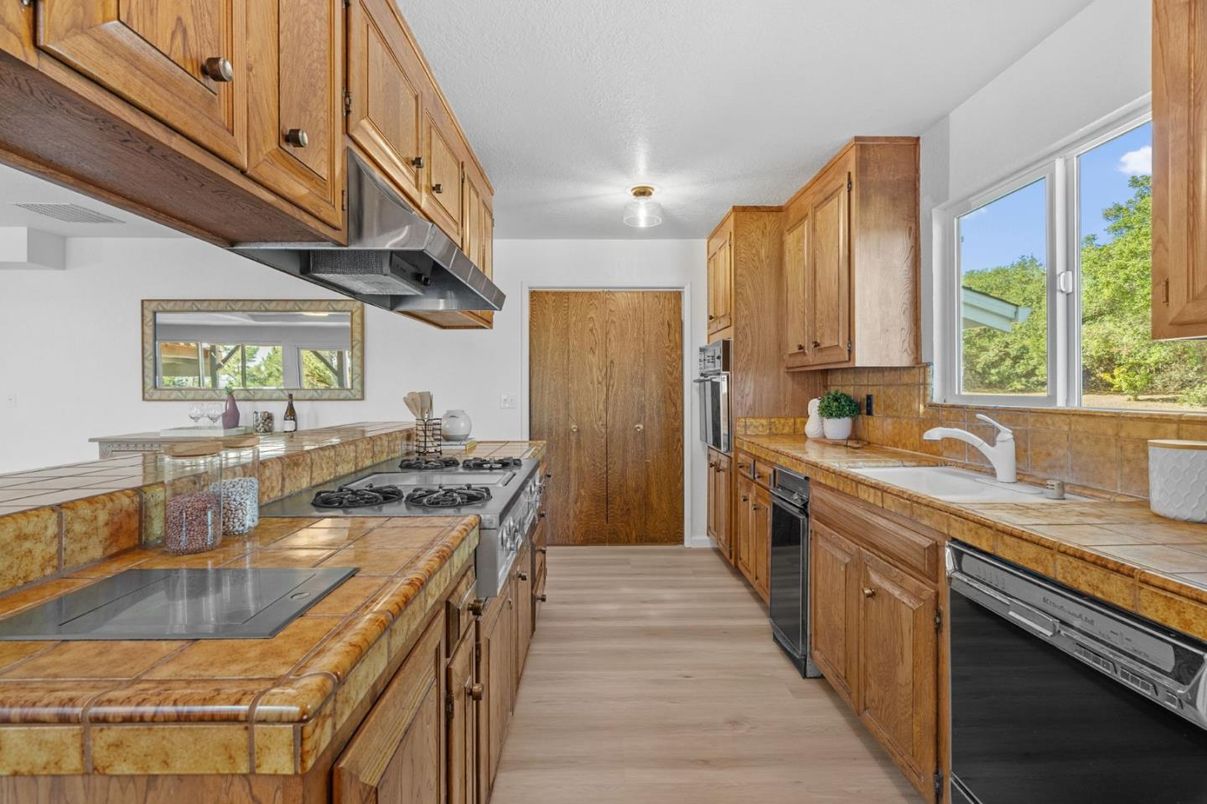 Interior, Kitchen, Tile Countertops, Wood Texture Flooring