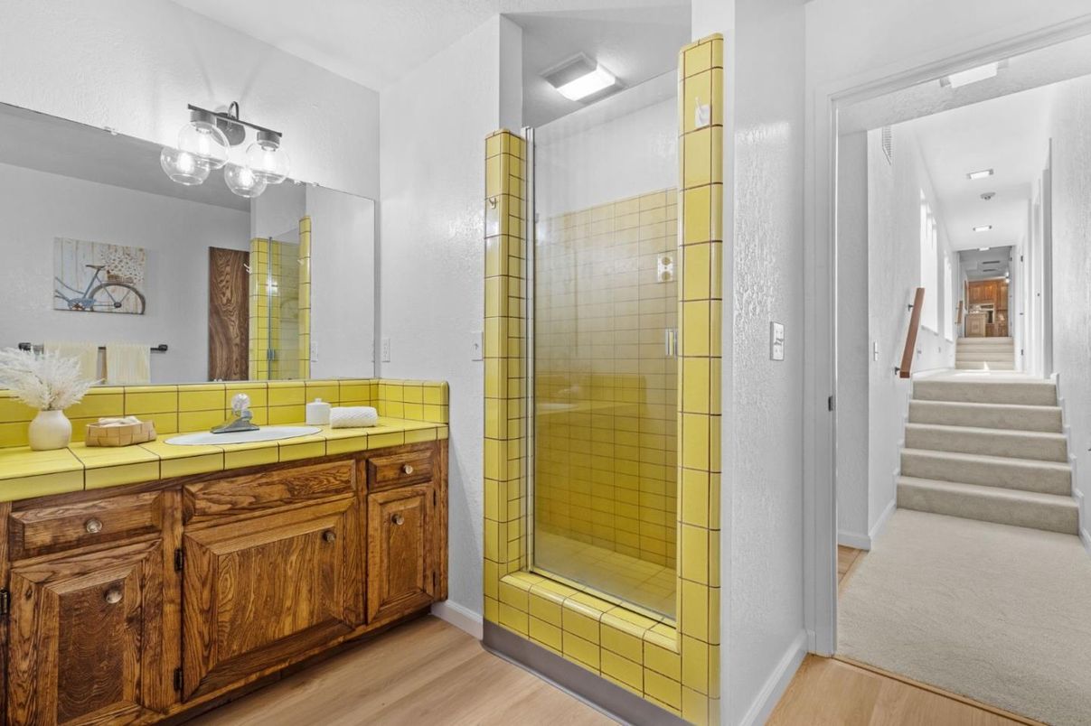 Bathroom, Glass Shower, Interior, Recessed Lighting, Tile Countertops, Wood Texture Flooring