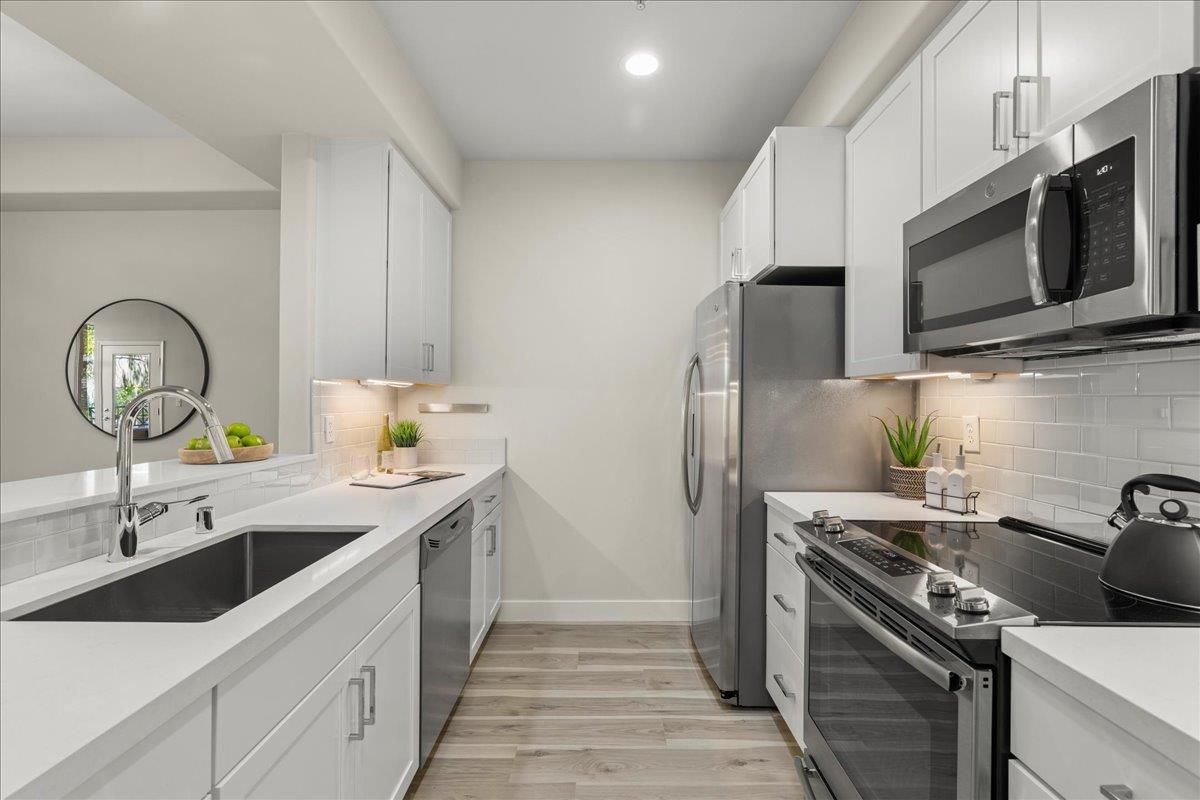 Interior, Kitchen, Recessed Lighting, Stainless Steel Appliances, Wood Texture Flooring