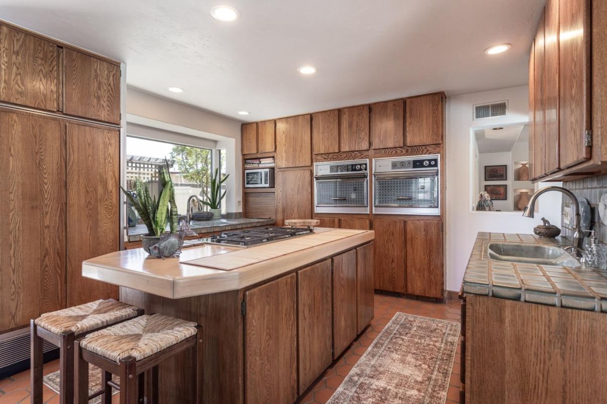 Interior, Kitchen, Recessed Lighting, Tile Countertops, Wood Texture Flooring