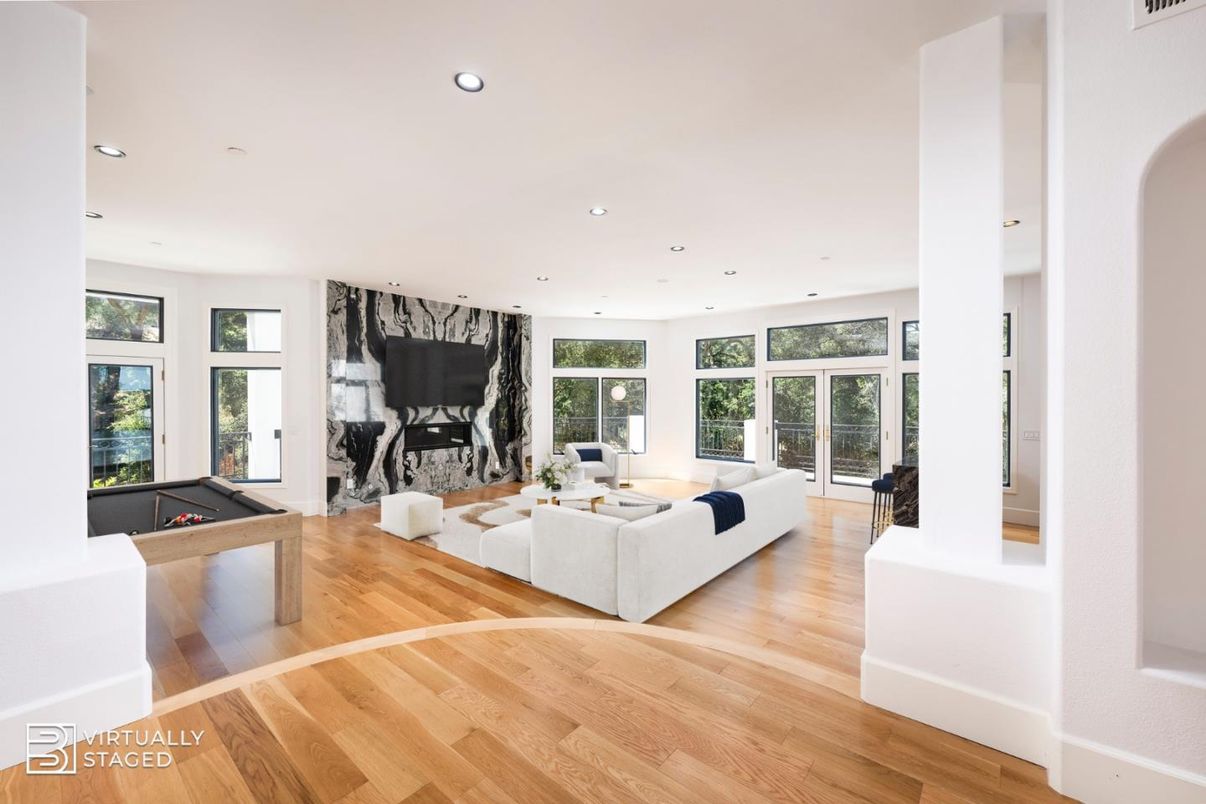 Billiard Table, Fireplace, Game Room, Interior, Living room, Recessed Lighting, Wood Texture Flooring