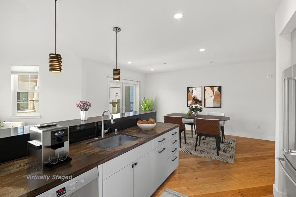 Dining room, Interior, Kitchen, Pendant Lights, Recessed Lighting, Stainless Steel Appliances, Wood Texture Flooring