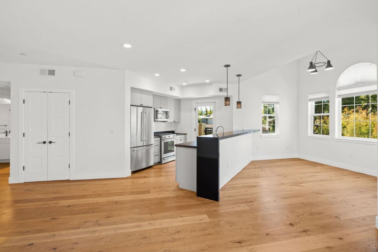 Interior, Kitchen, Pendant Lights, Recessed Lighting, Stainless Steel Appliances, Wood Texture Flooring