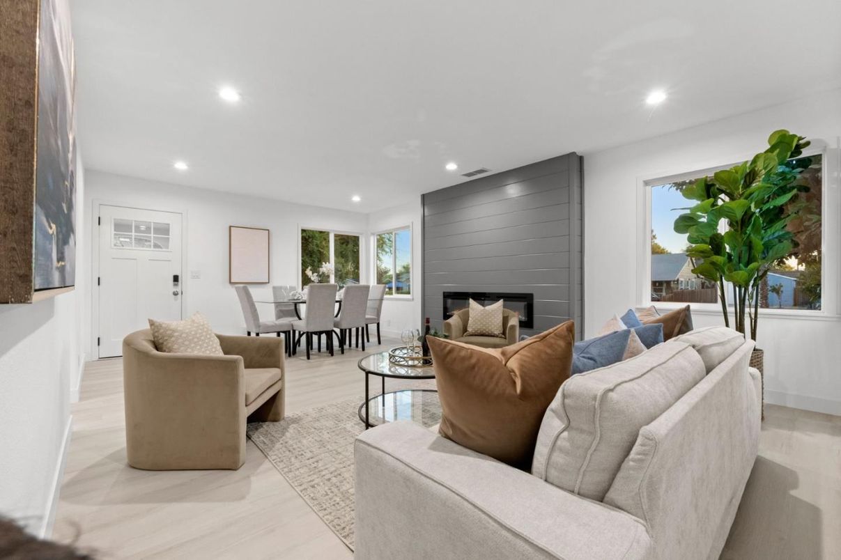 Dining room, Fireplace, Interior, Living room, Recessed Lighting, Wood Texture Flooring