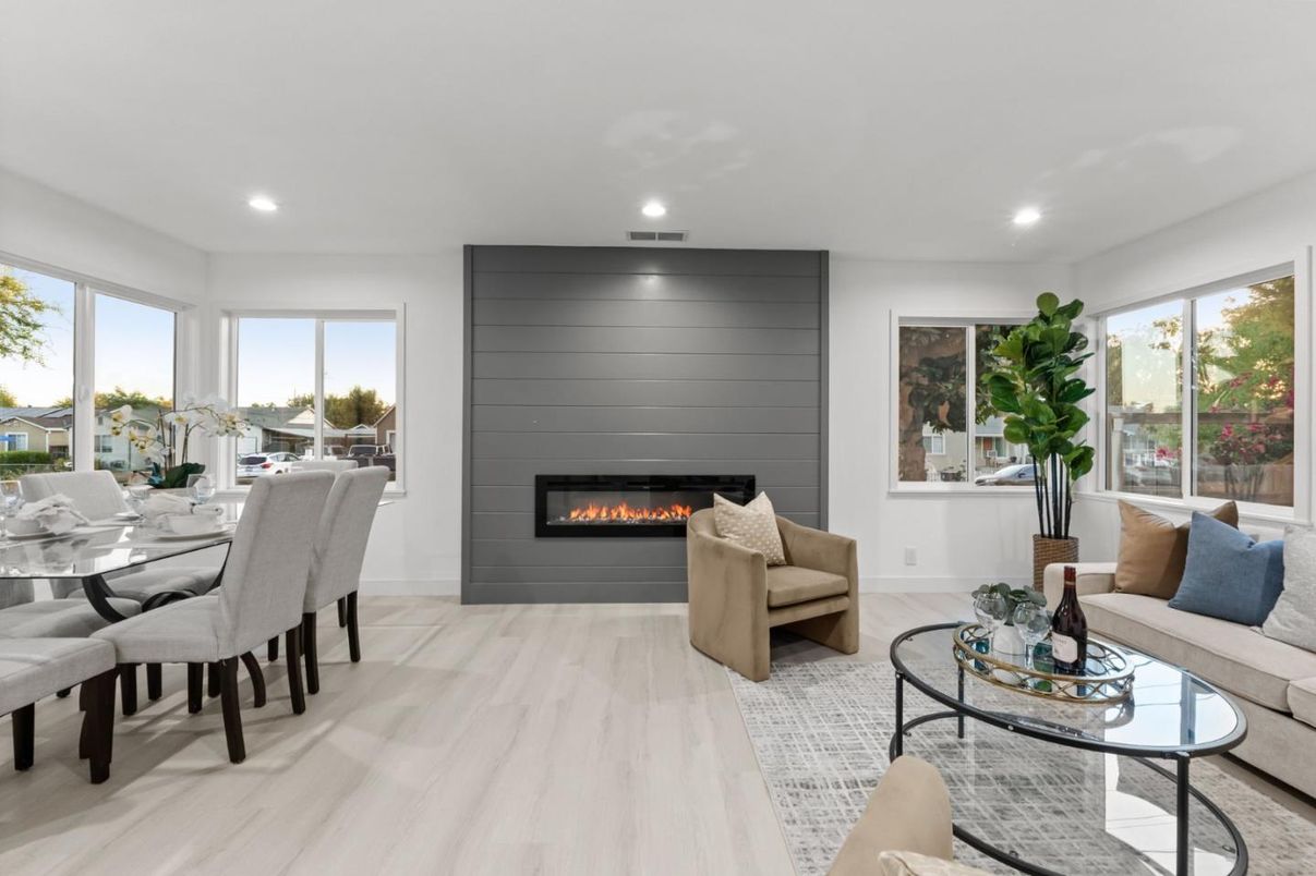 Dining room, Fireplace, Interior, Living room, Recessed Lighting, Wood Texture Flooring