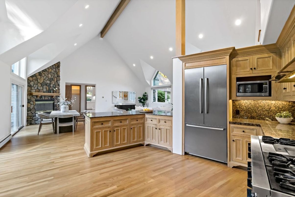 Fireplace, Interior, Kitchen, Recessed Lighting, Stainless Steel Appliances, Stone Walls, Wooden Beams, Wood Texture Flooring