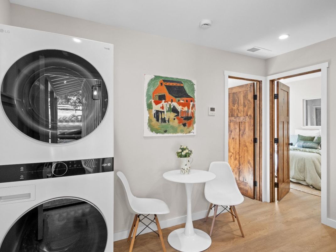 Bedroom, Interior, Recessed Lighting, Utility Closets, Washer, Wood Texture Flooring