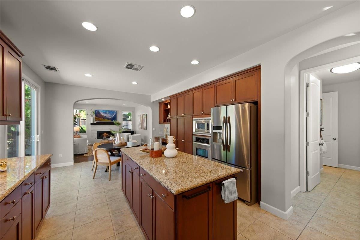 Dining room, Fireplace, Interior, Kitchen, Living room, Recessed Lighting, Stainless Steel Appliances