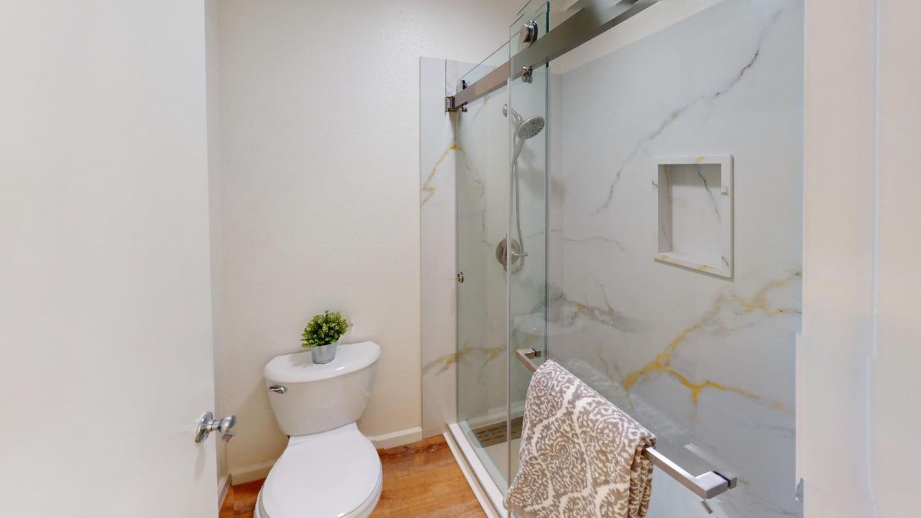 Bathroom, Glass Shower, Interior, Marble Walls, Wood Texture Flooring