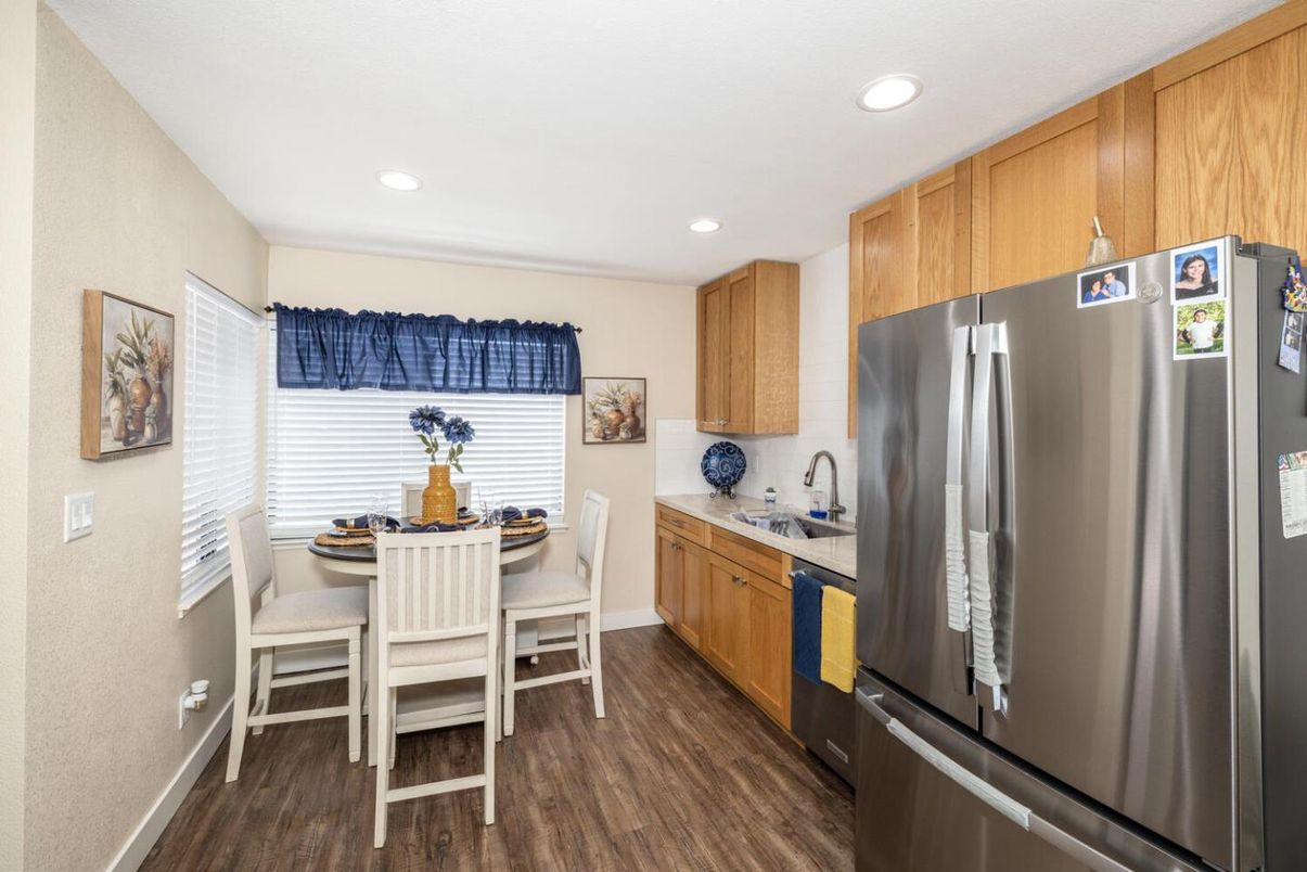 Dining room, Interior, Kitchen, Recessed Lighting, Stainless Steel Appliances, Wood Texture Flooring
