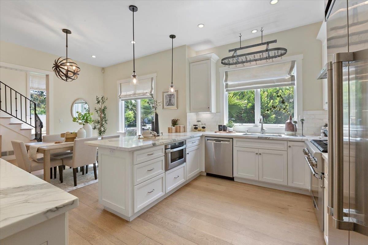Dining room, Interior, Kitchen, Pendant Lights, Recessed Lighting, Stainless Steel Appliances, Wood Texture Flooring