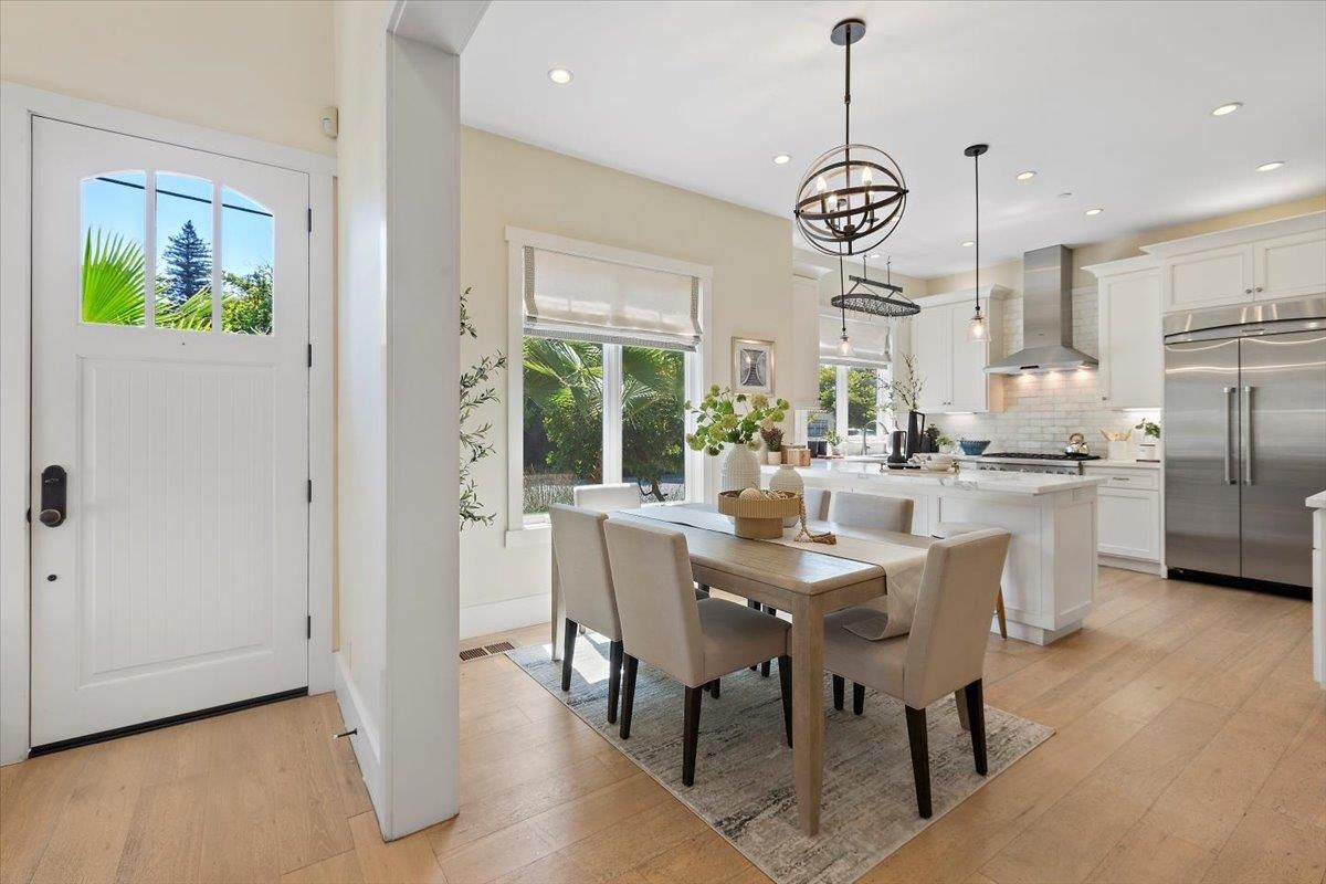 Dining room, Interior, Kitchen, Pendant Lights, Recessed Lighting, Stainless Steel Appliances, Wood Texture Flooring