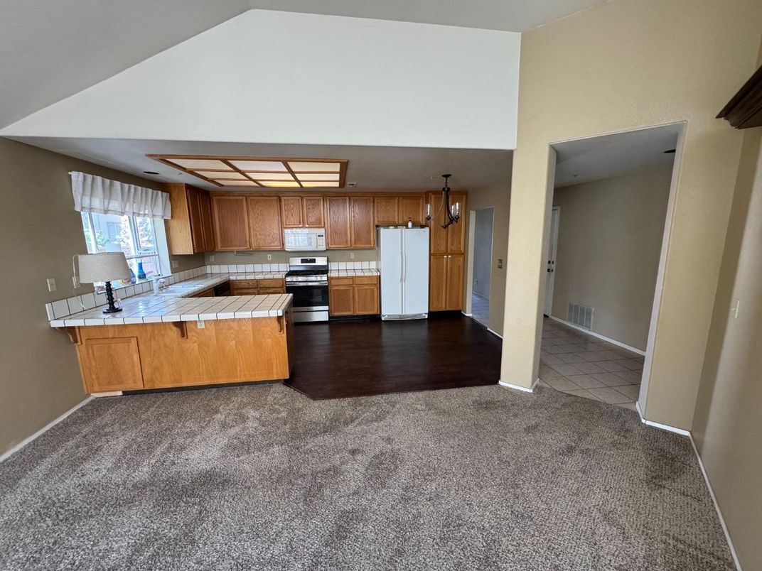 Interior, Kitchen, Tile Countertops, Wood Texture Flooring