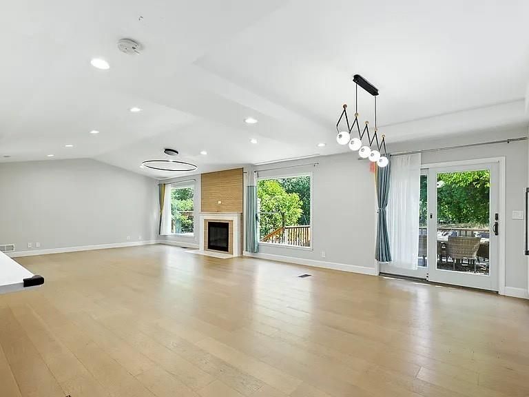 Empty room, Fireplace, Interior, Pendant Lights, Recessed Lighting, Wood Texture Flooring